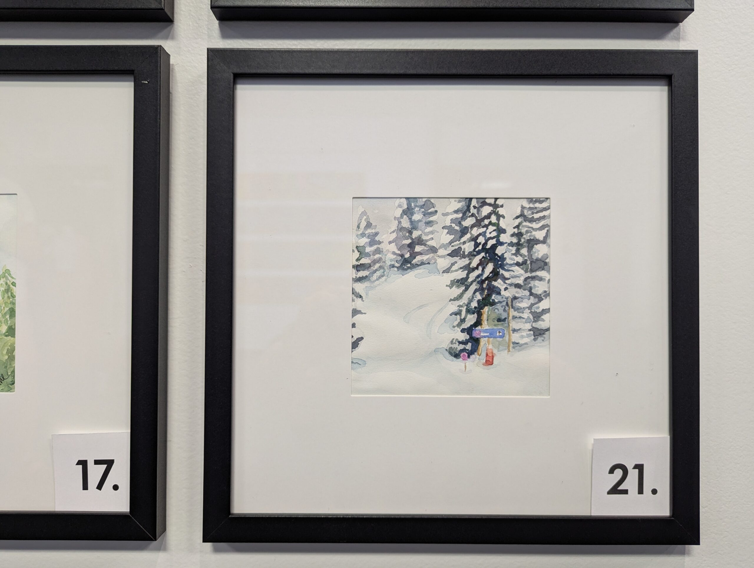 5x5 watercolor painting of Duster, a snowshoe trail in Steamboat CO. in a 10x10 frame.