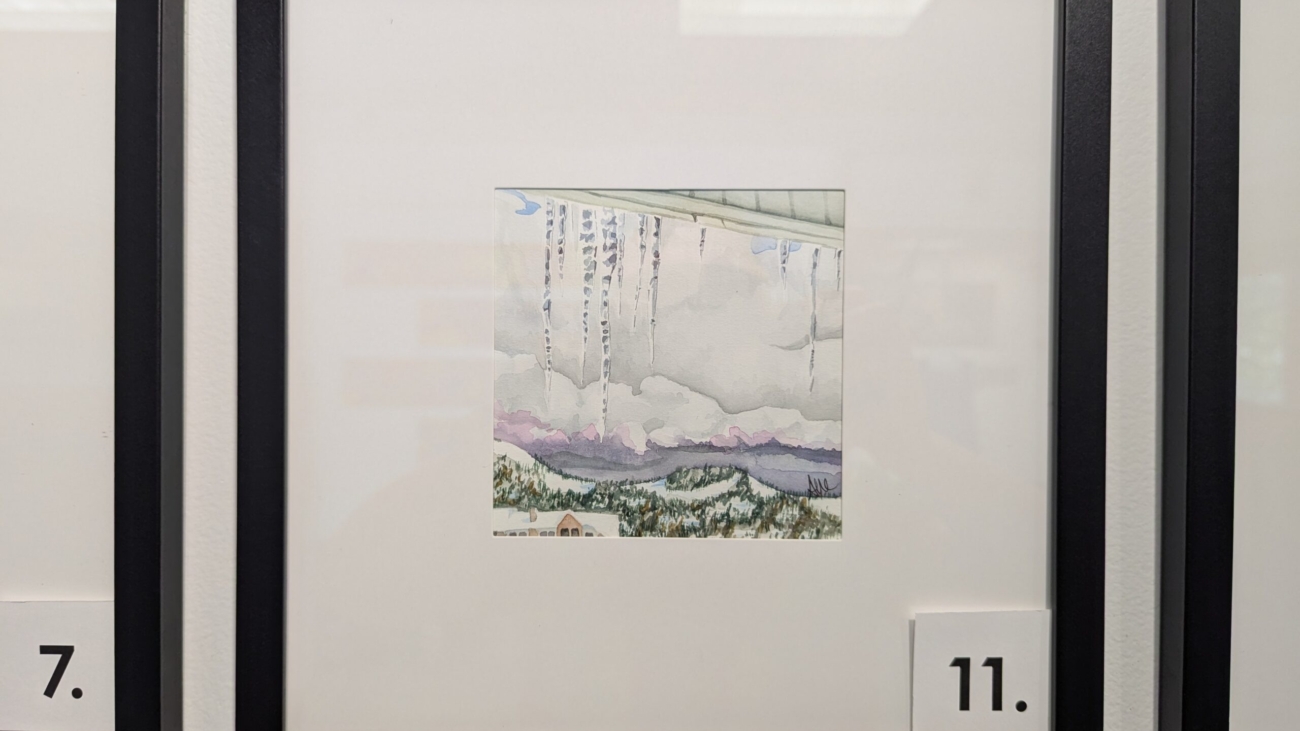 5x5 watercolor painting of the view from Ski Time Square in a 10x10 frame.