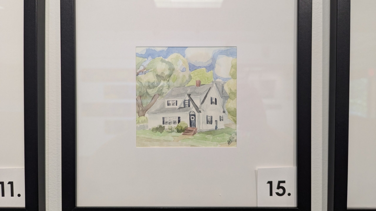 5x5 watercolor painting of a white house on oak street in a 10x10 frame.