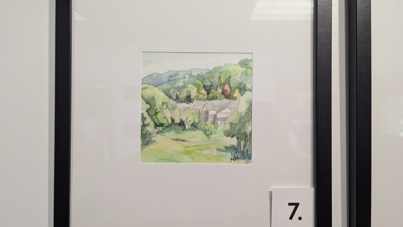 5x5 watercolor painting of the lodge at McIntyre Ski Hill in Manchester, NH, in a 10x10 frame.