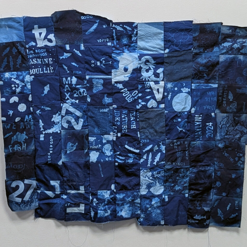 A deep blue cyanotype made with Franklin High School students in response to Ken Burn's Leonardo Da Vinci Documentary