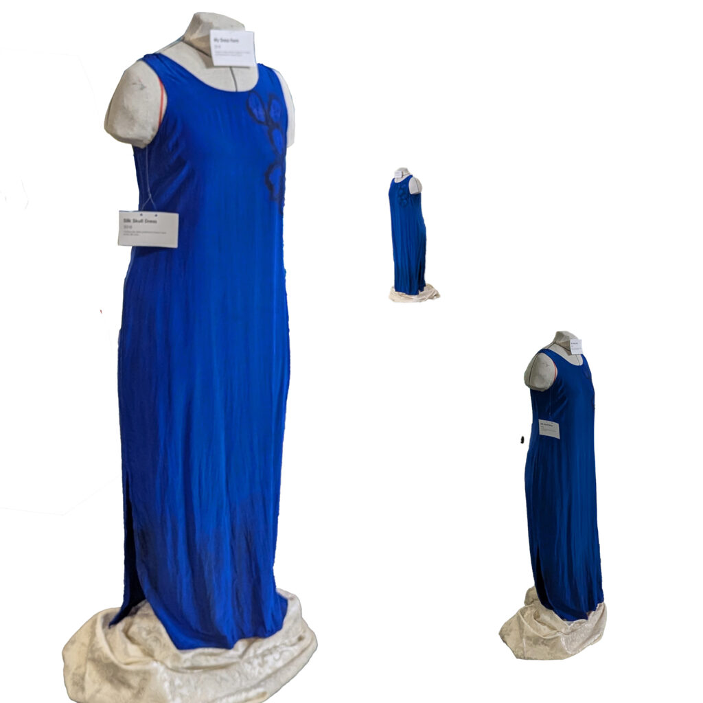 Three images of the same silk blue dress with a few skulls outlined in black on the left shoulder.
