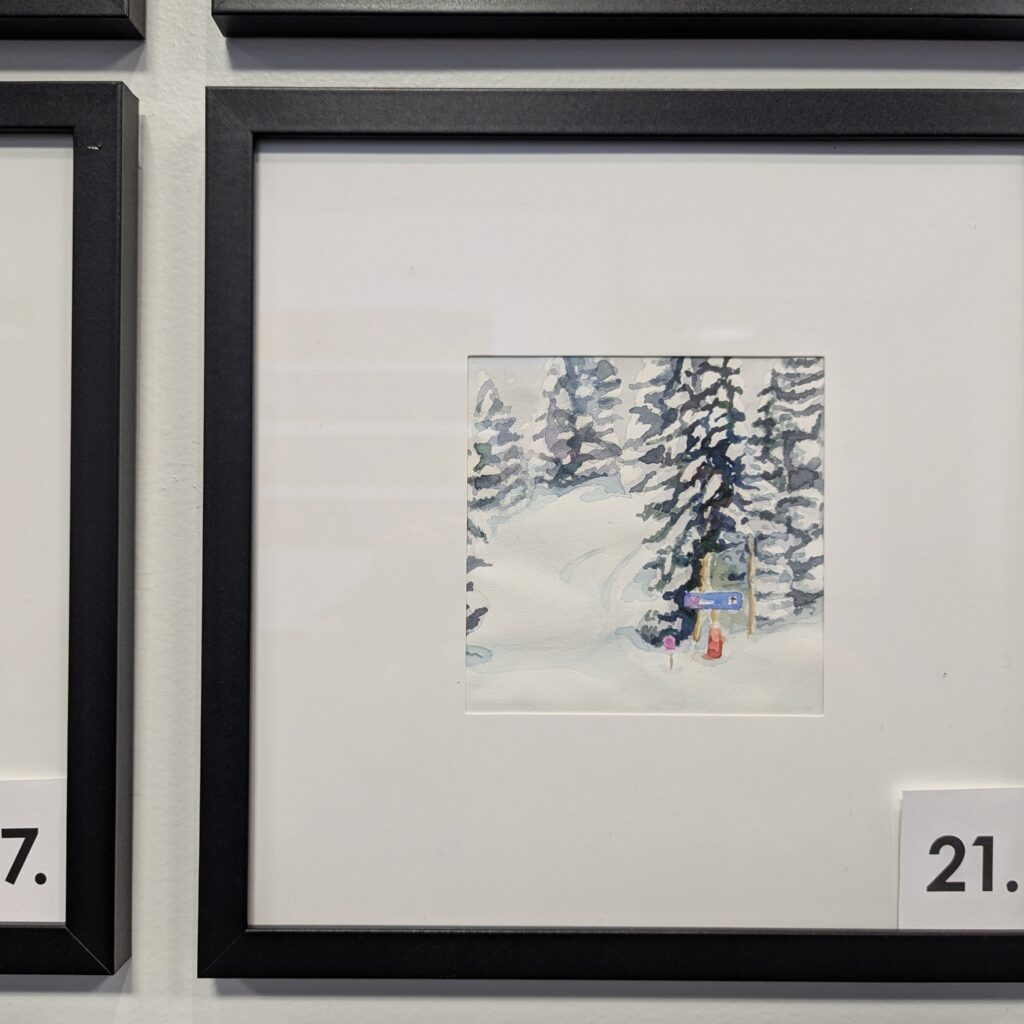 A 5x5 watercolor of the trailhead to Duster, a snowshoe track in Steamboat Colorado. It is in a 10x10 frame.