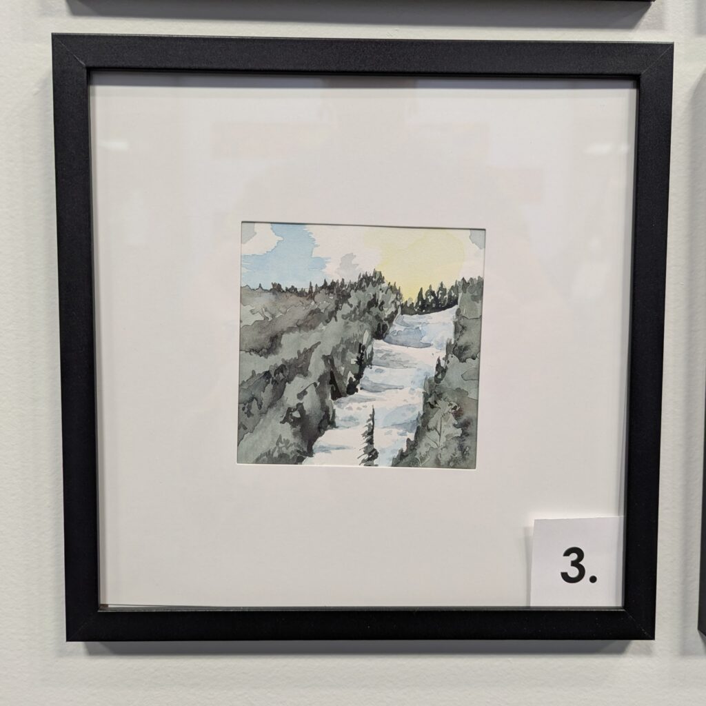 5x5 watercolor painting of a ski slope in Maine in a 10x10 frame.
