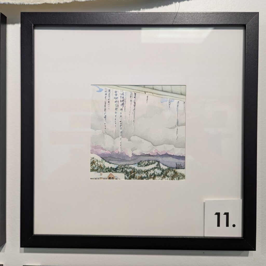5x5 watercolor painting of the view from Ski Time Square in a 10x10 frame.